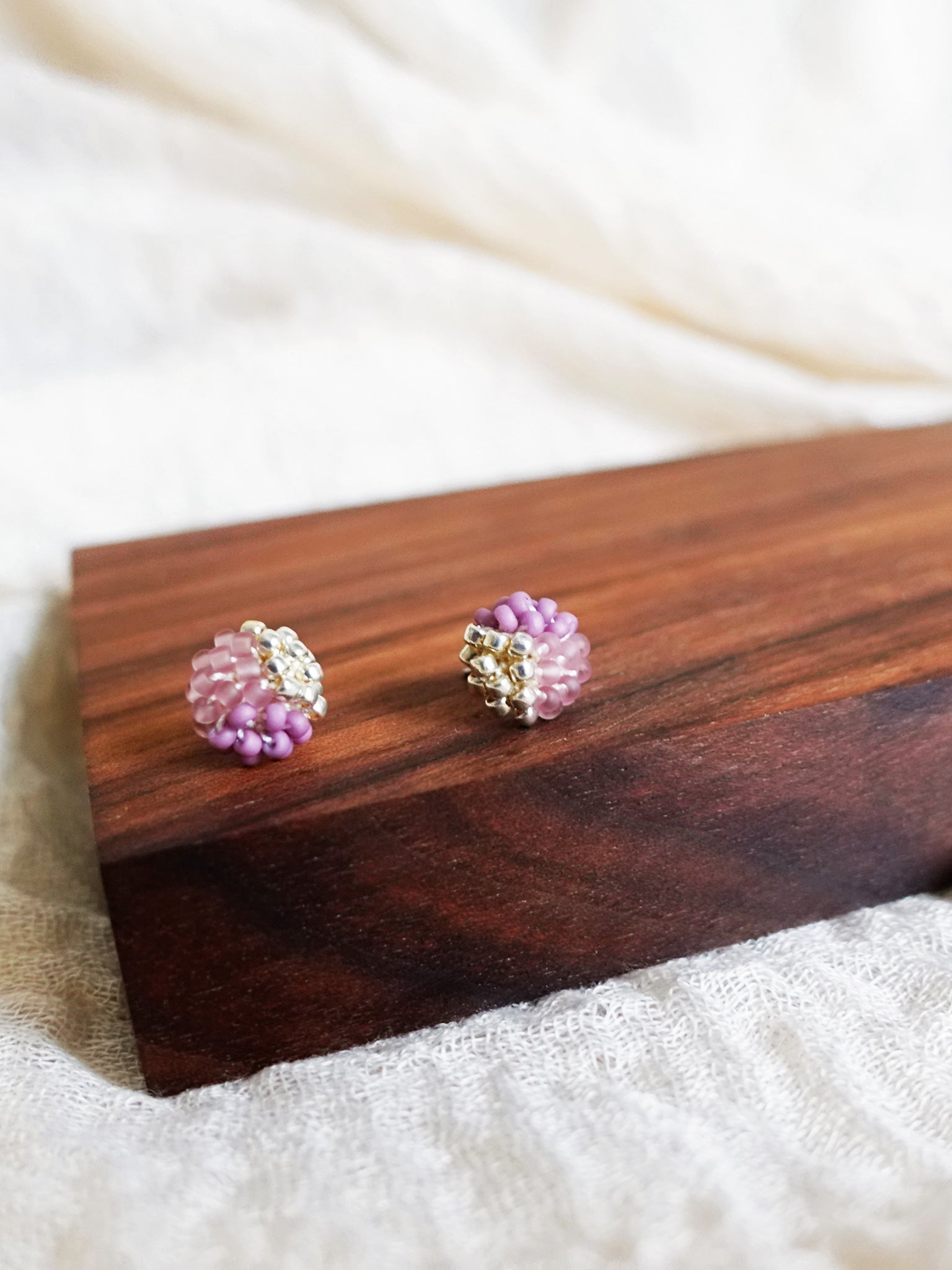 Trio Velvet Stud Earrings in Mauve Purple Display Left