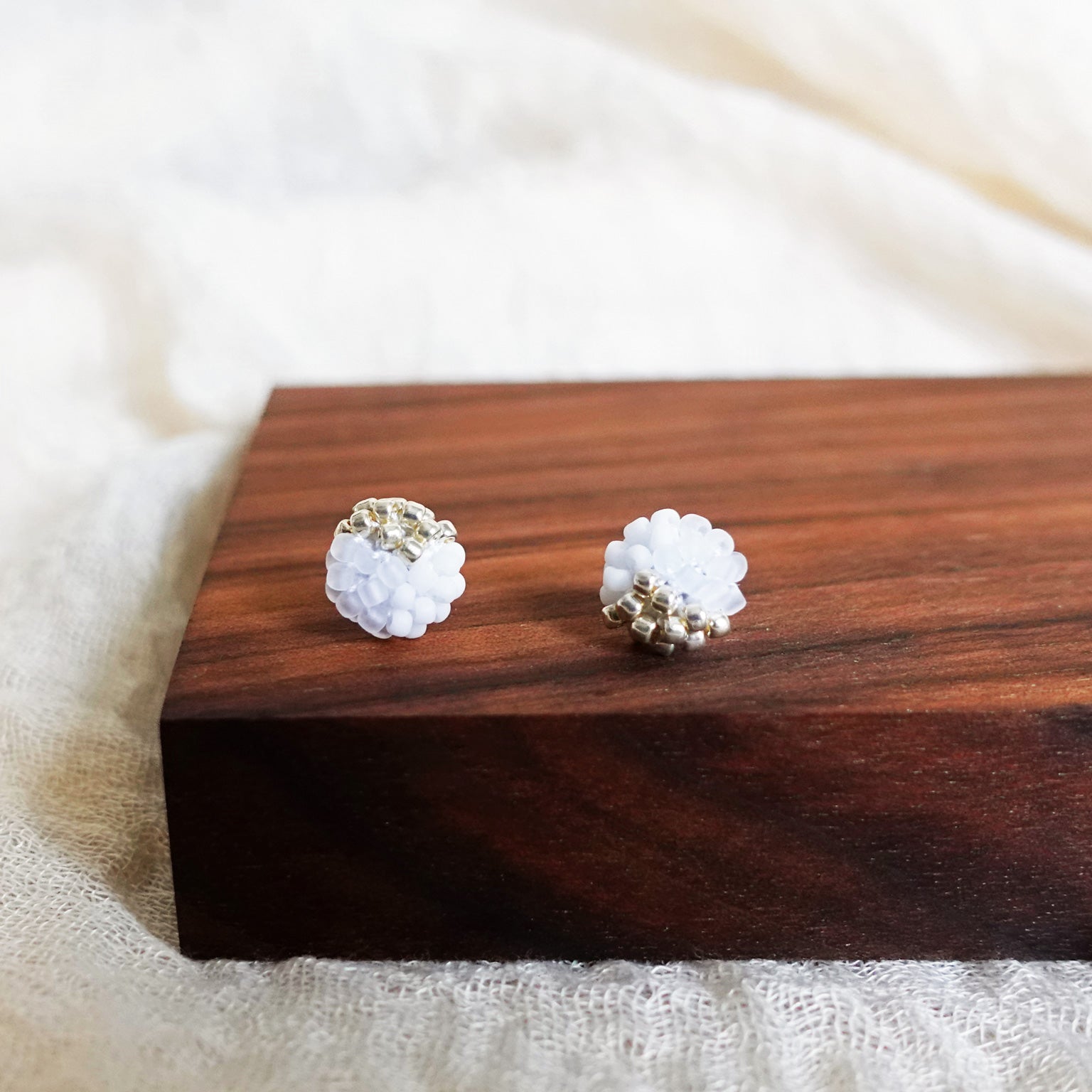 Trio Velvet Stud Earrings in White Display Front Close