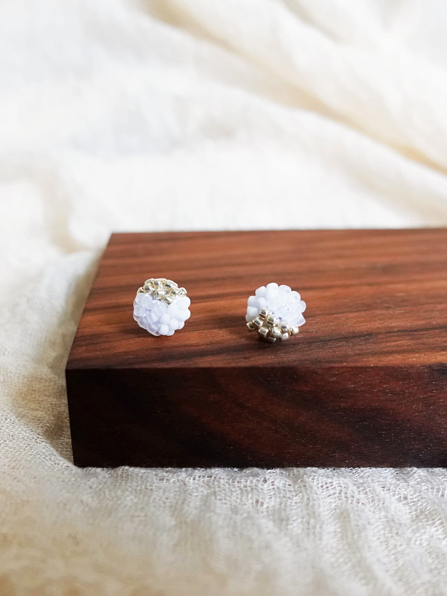 Trio Velvet Stud Earrings in White Display Front Close