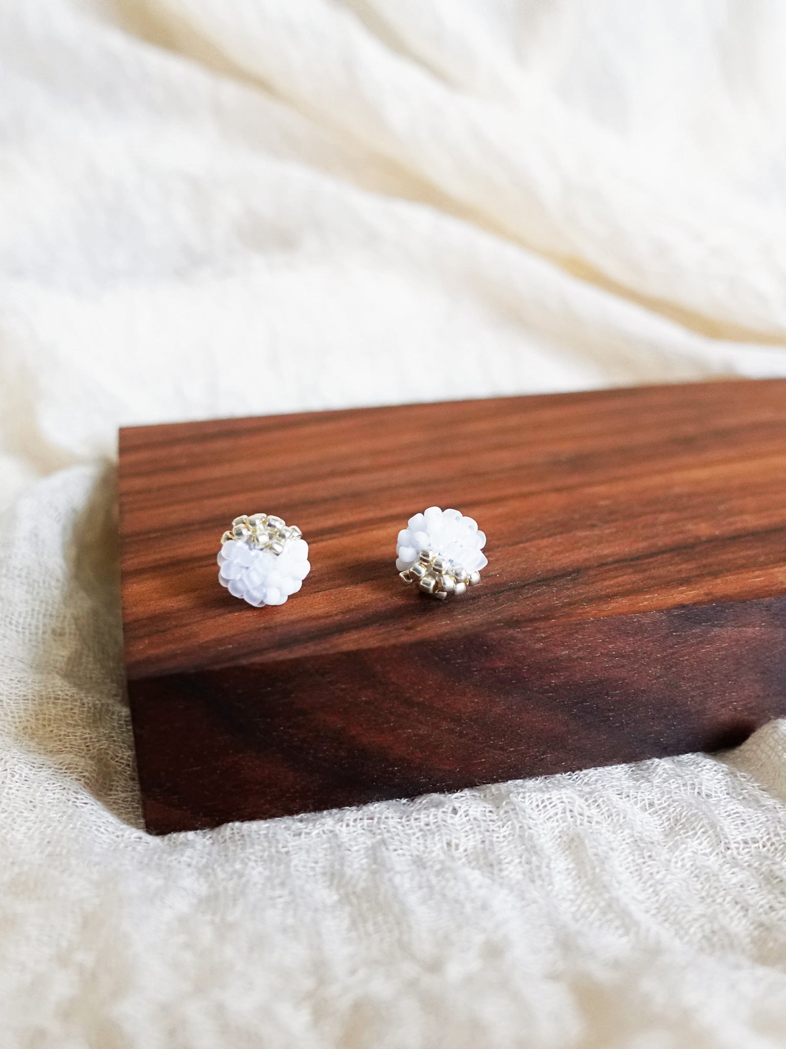 Trio Velvet Stud Earrings in White Display Left