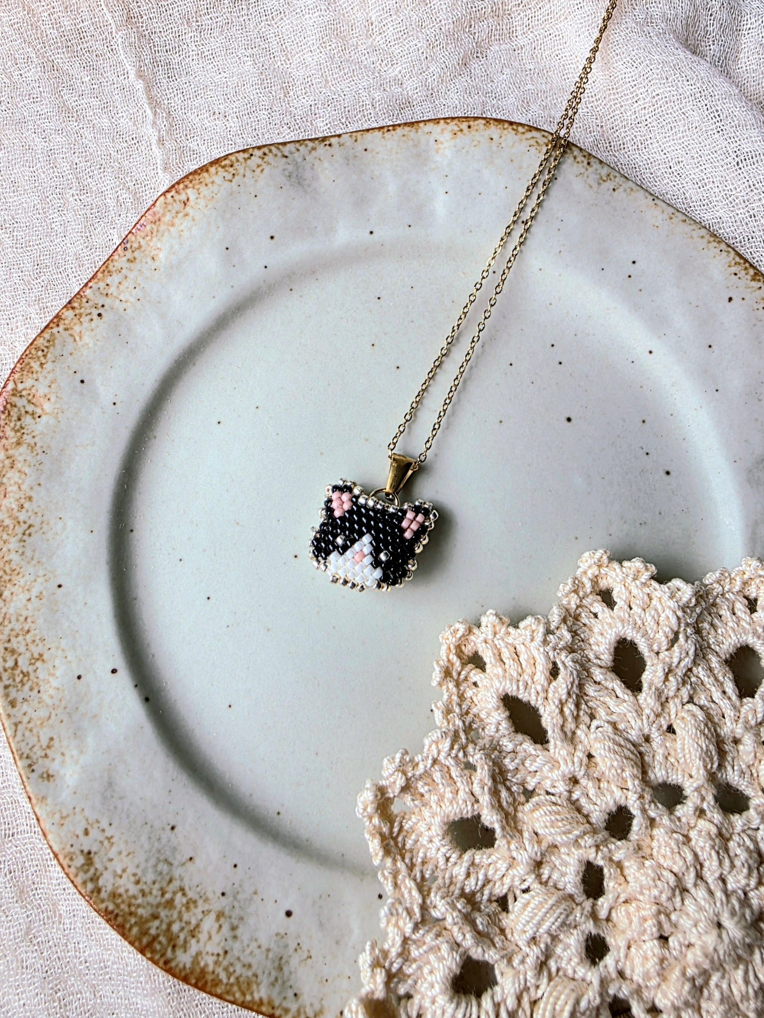 Tuxedo cat necklace right