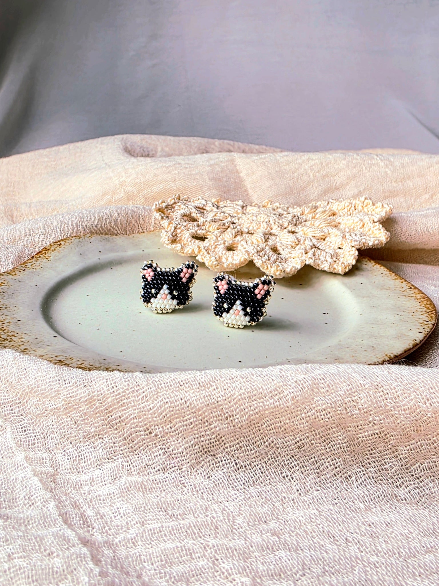Tuxedo cat stud earrings front