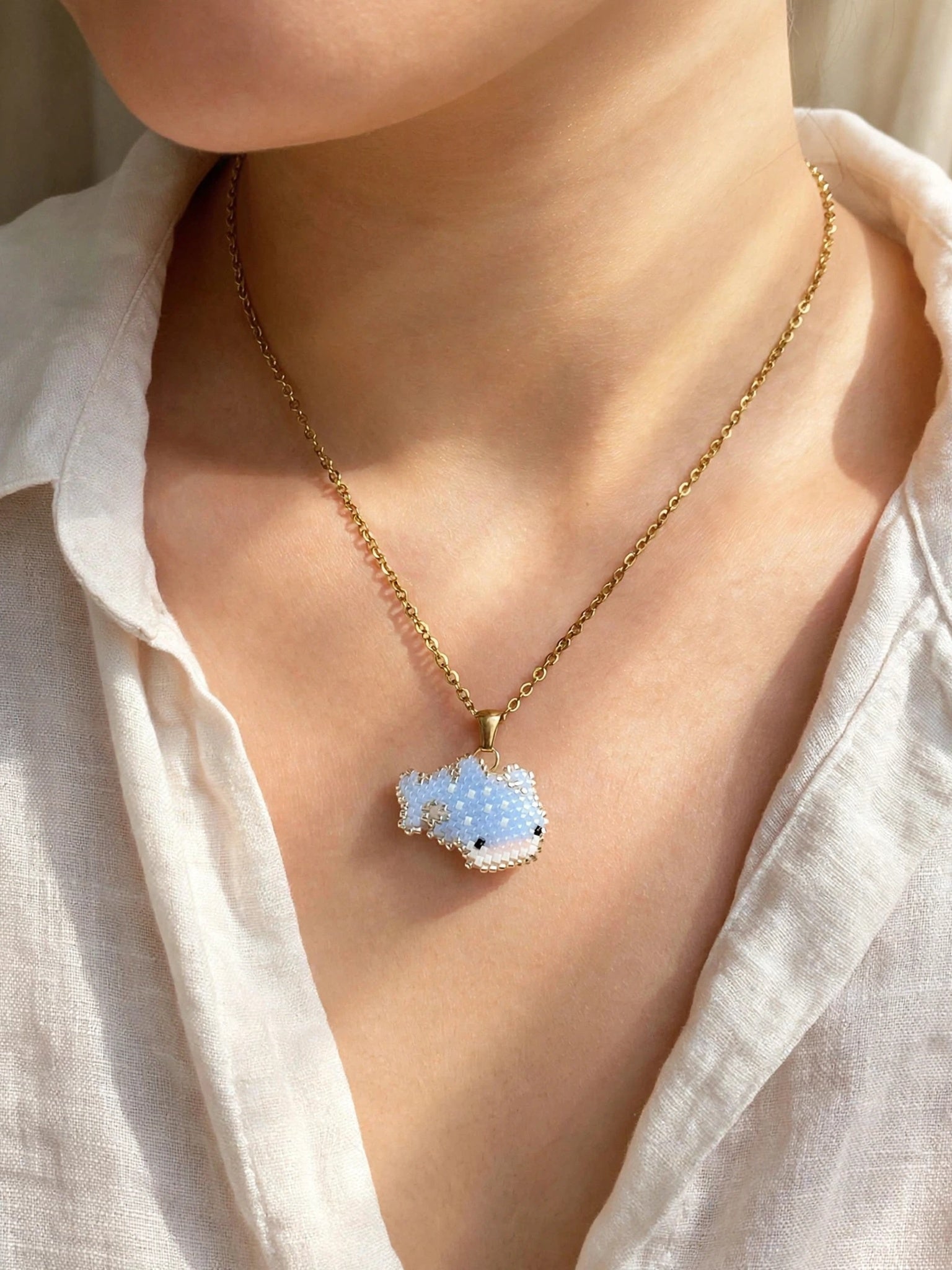 Whale shark necklace on model