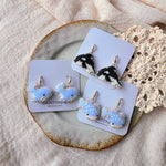 Whales drop earrings on cards group