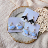 Whales drop earrings on cards group