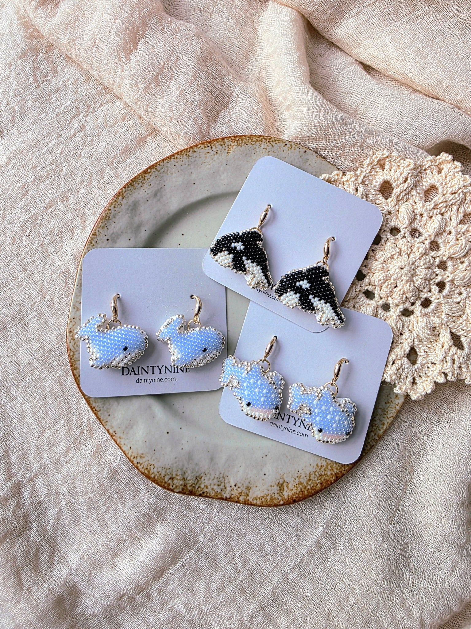 Whales drop earrings on cards group