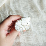 White Bear Loaf Brooch Pin Held