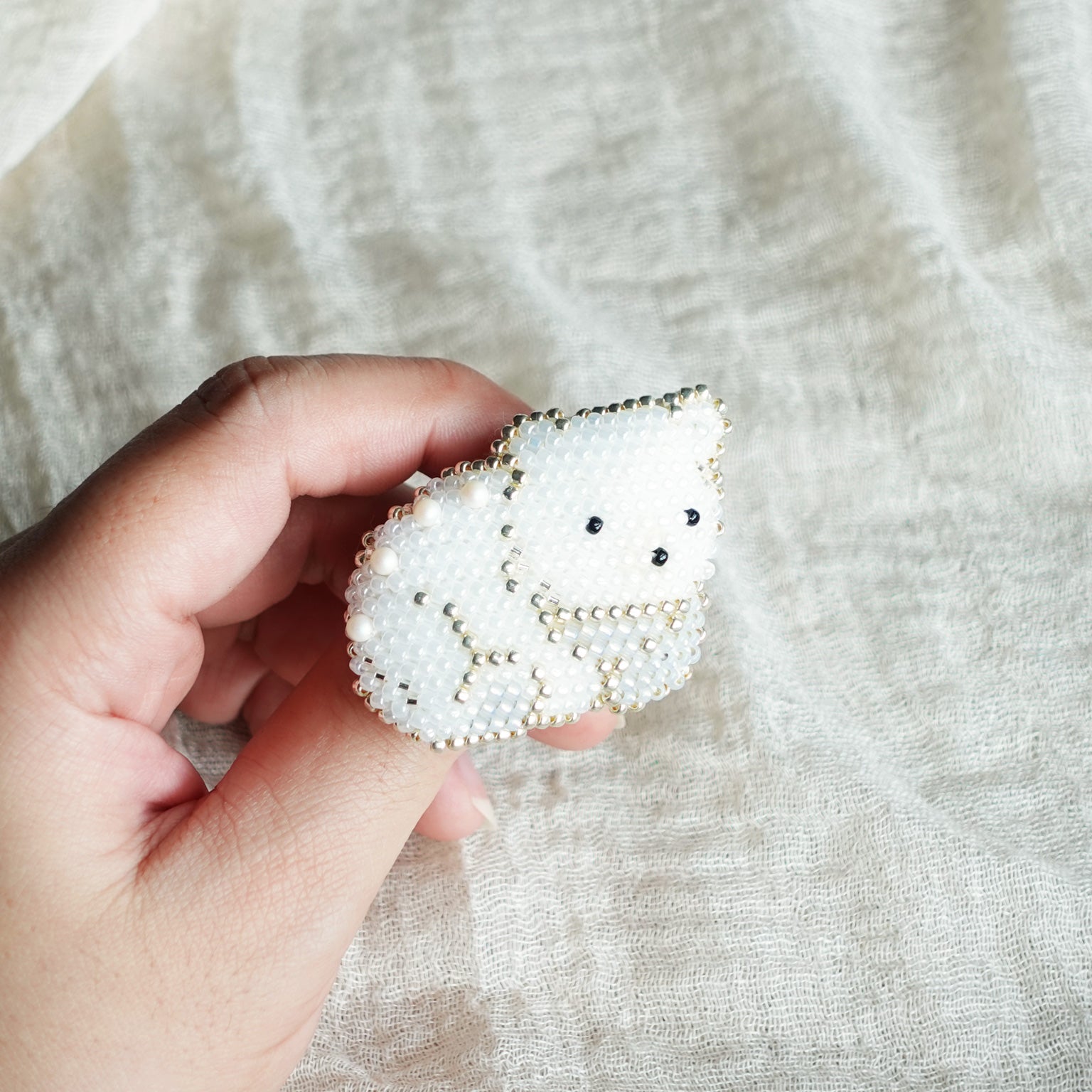 White Bear Loaf Brooch Pin Held