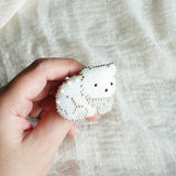 White Bear Loaf Brooch Pin Held