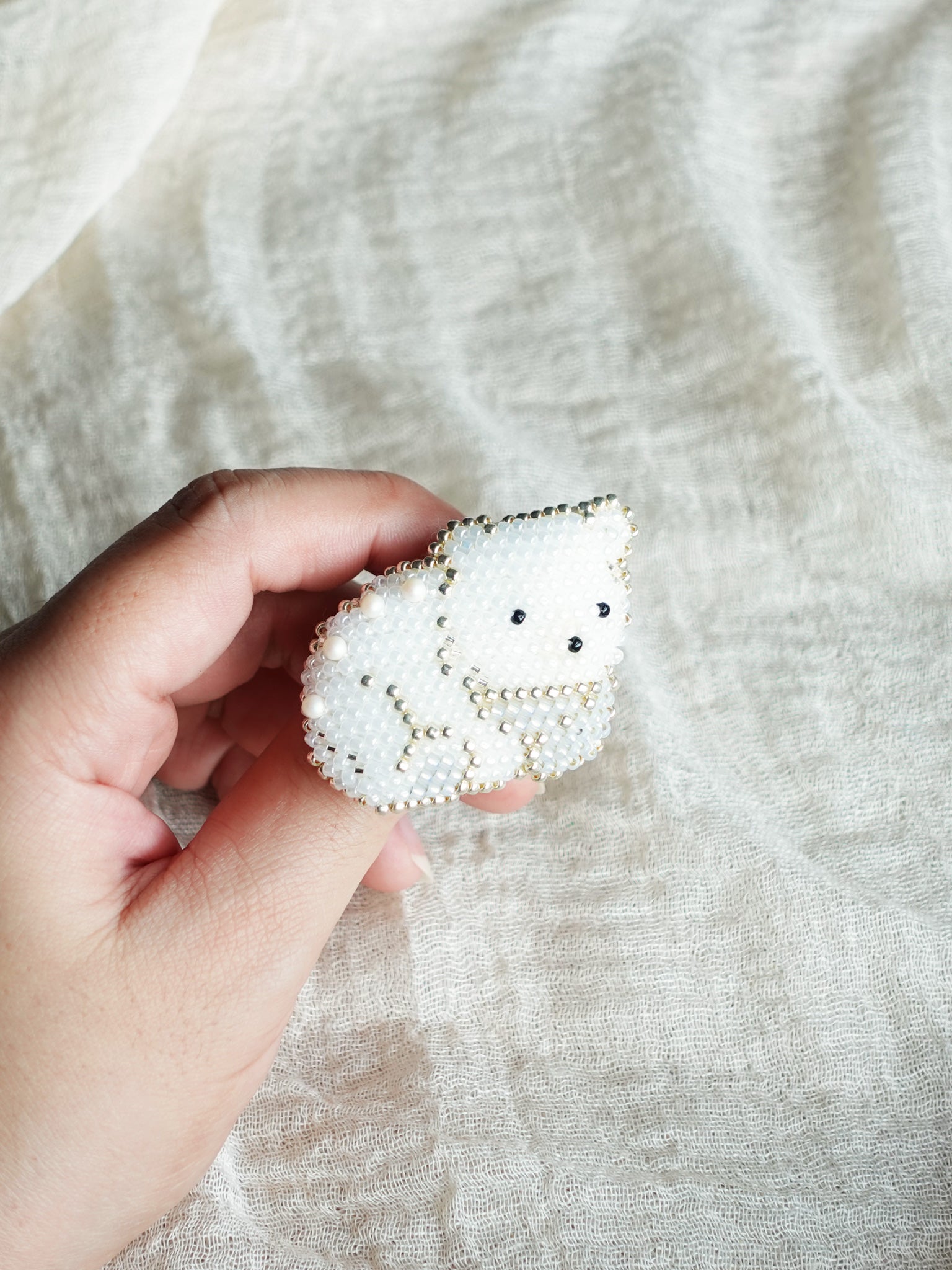 White Bear Loaf Brooch Pin Held