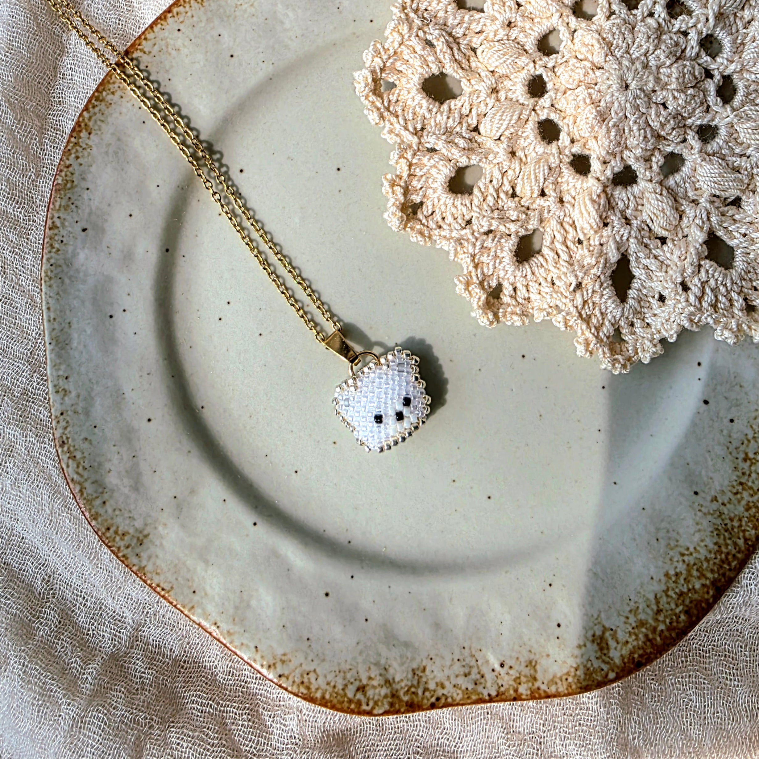 White bear necklace left
