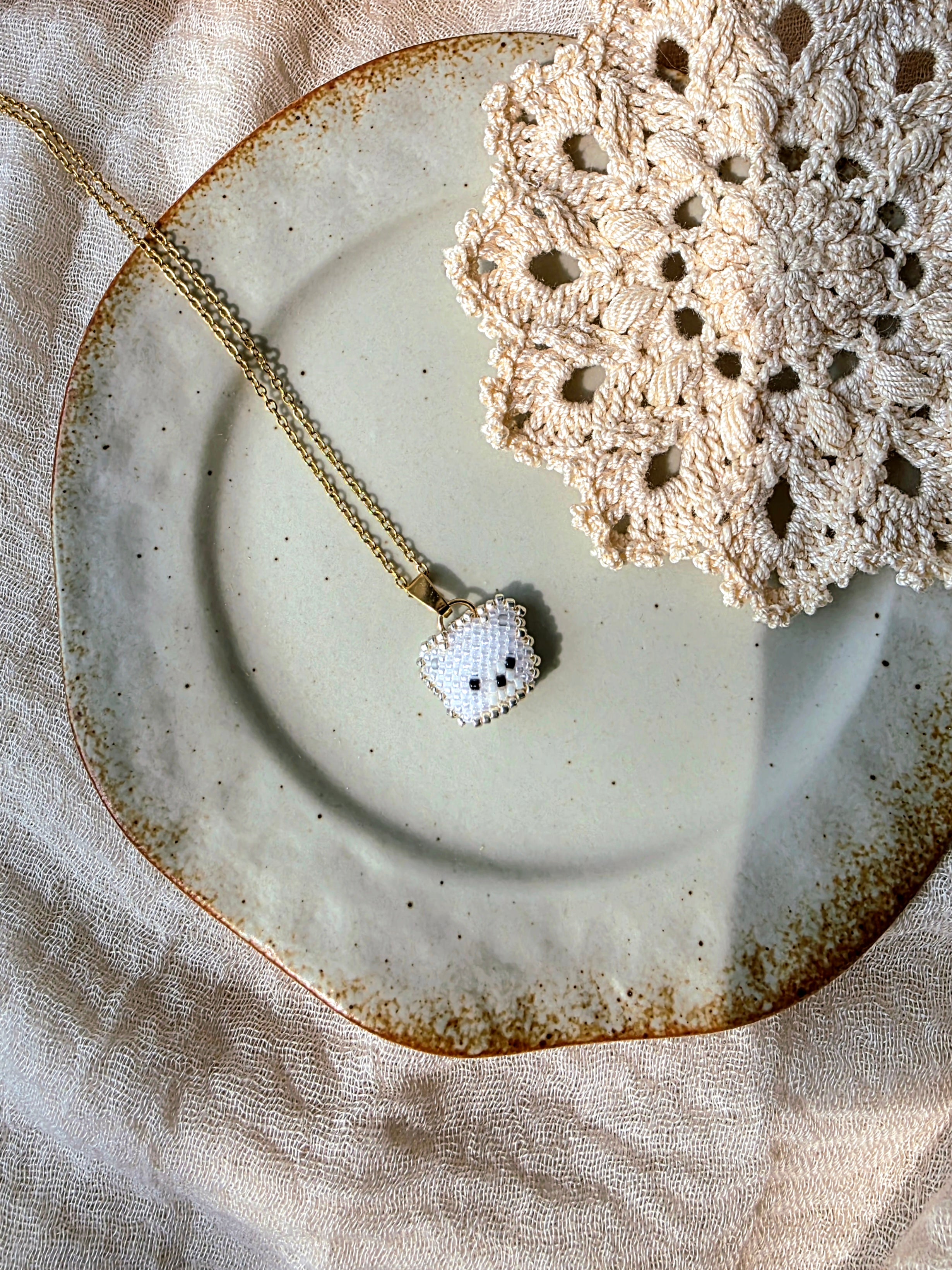 White bear necklace left