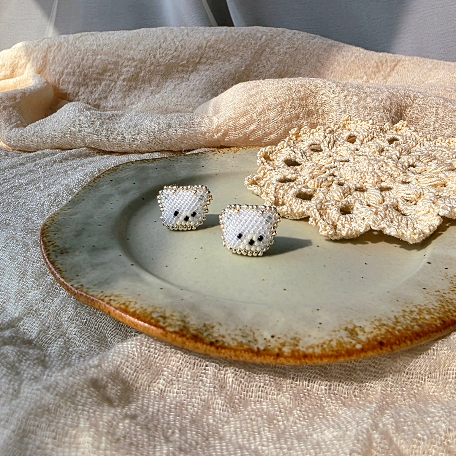 White bear stud earrings front