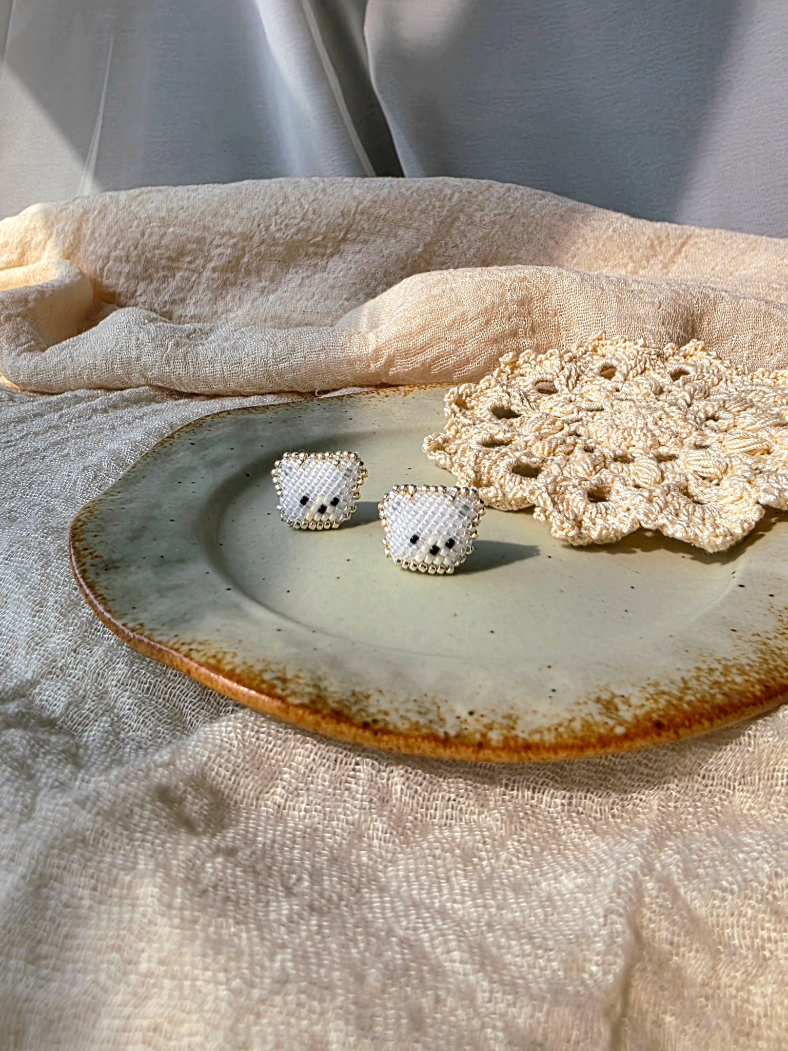 White bear stud earrings front