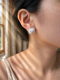 White bear stud earrings on model