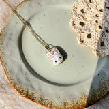 White bunny necklace left