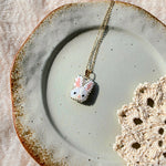 White bunny necklace right