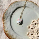 White bunny necklace right