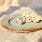 White bunny ring left