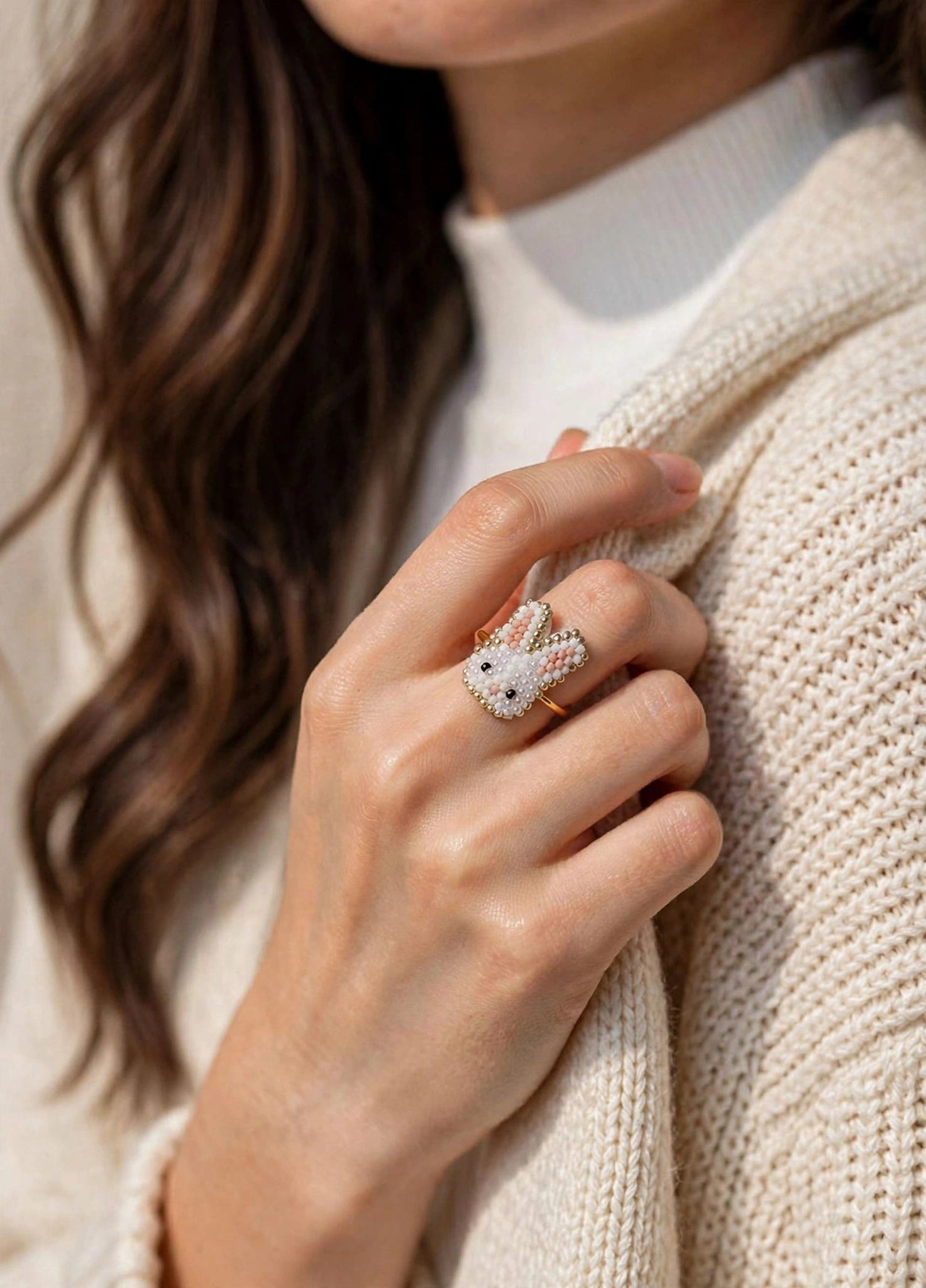 White bunny ring on model