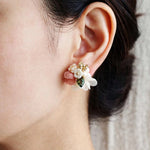 Wildpetals stud earrings in brown on model