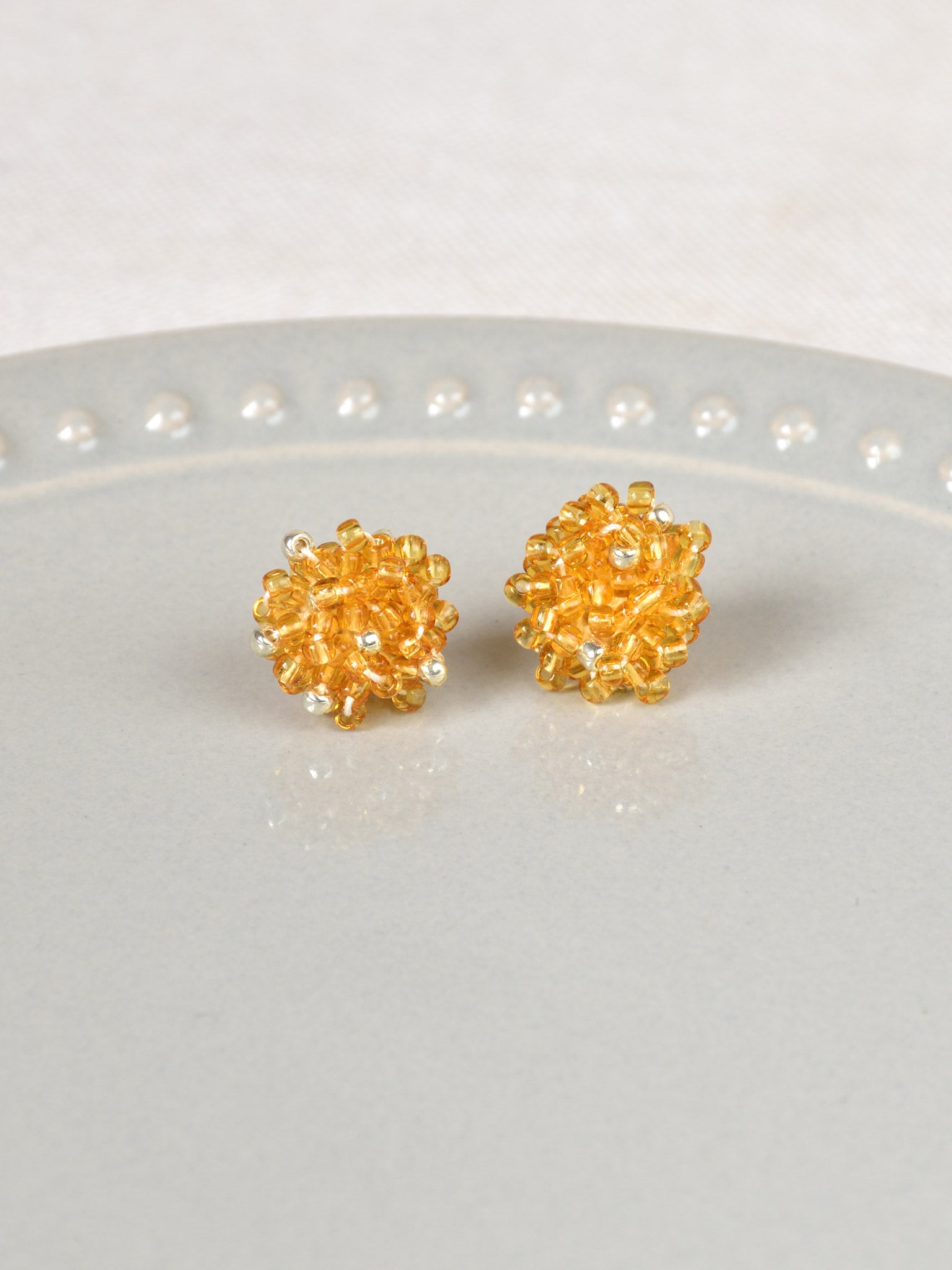 Ariel Stud Earrings in Topaz Plate
