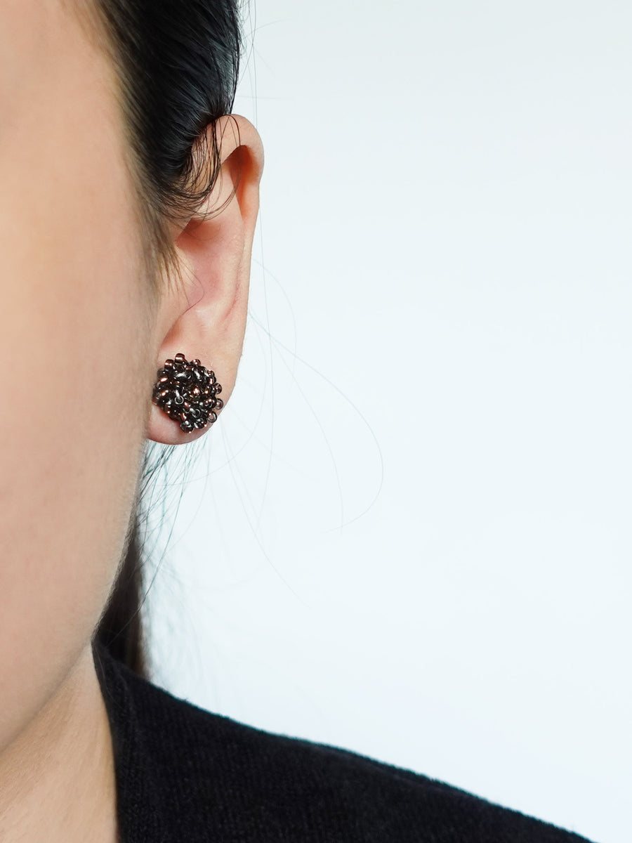 Ariel Stud Earrings in Umber Model
