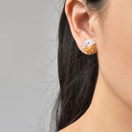Ariel Trio Stud Earrings in Purple and Topaz Model