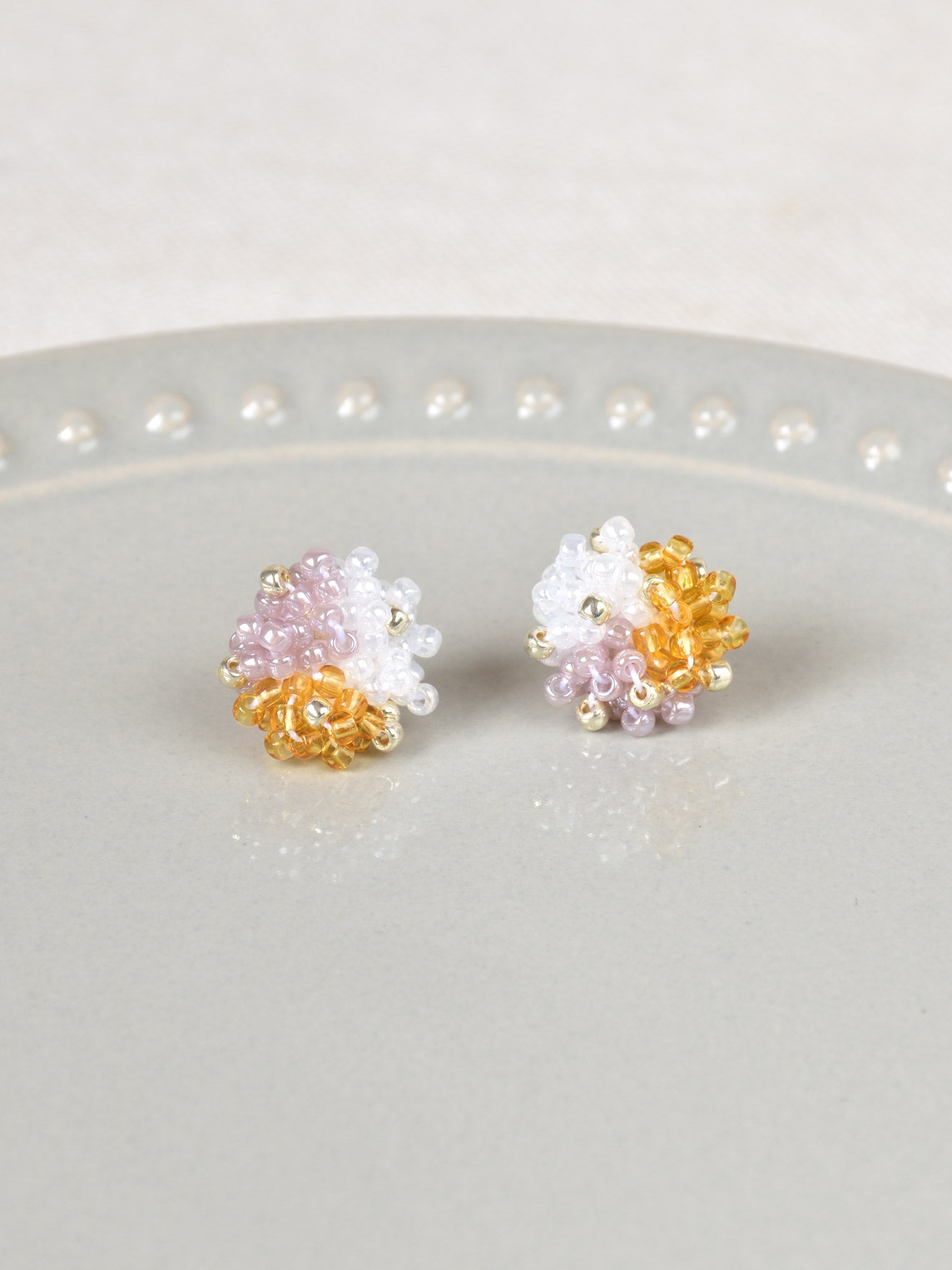 Ariel Trio Stud Earrings in Purple and Topaz Plate