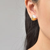 Ariel Trio Stud Earrings in Topaz Model