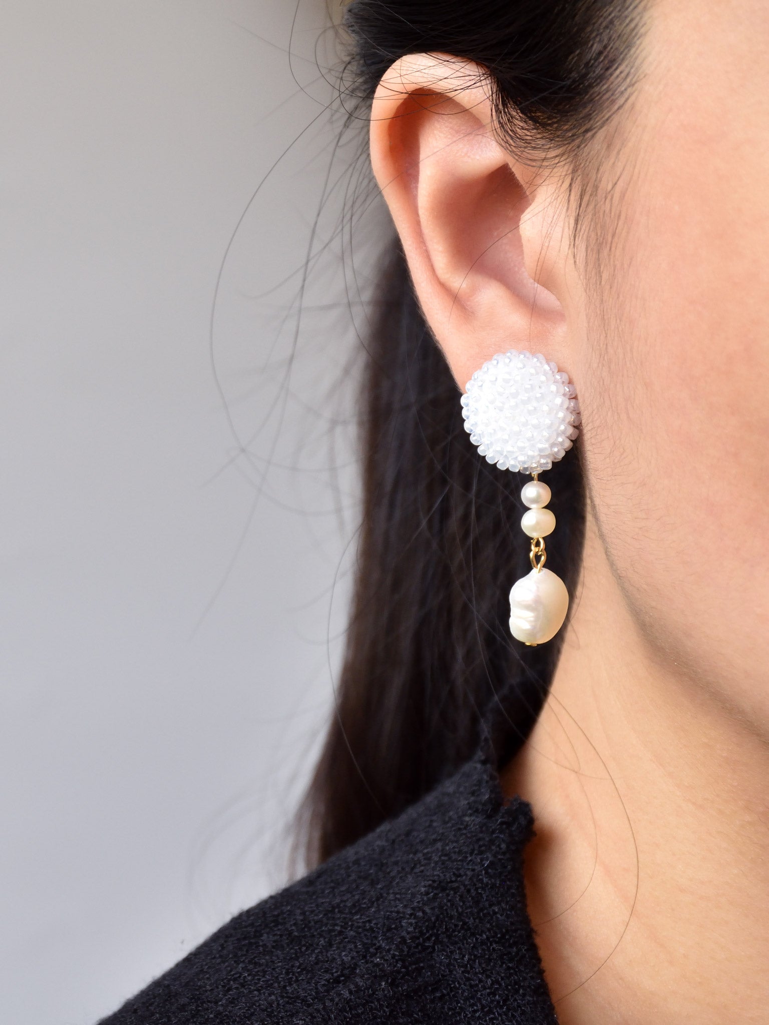 Calypso Dangle Earrings in White Model