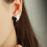 Camellia Dip Stud Earrings in Black Model