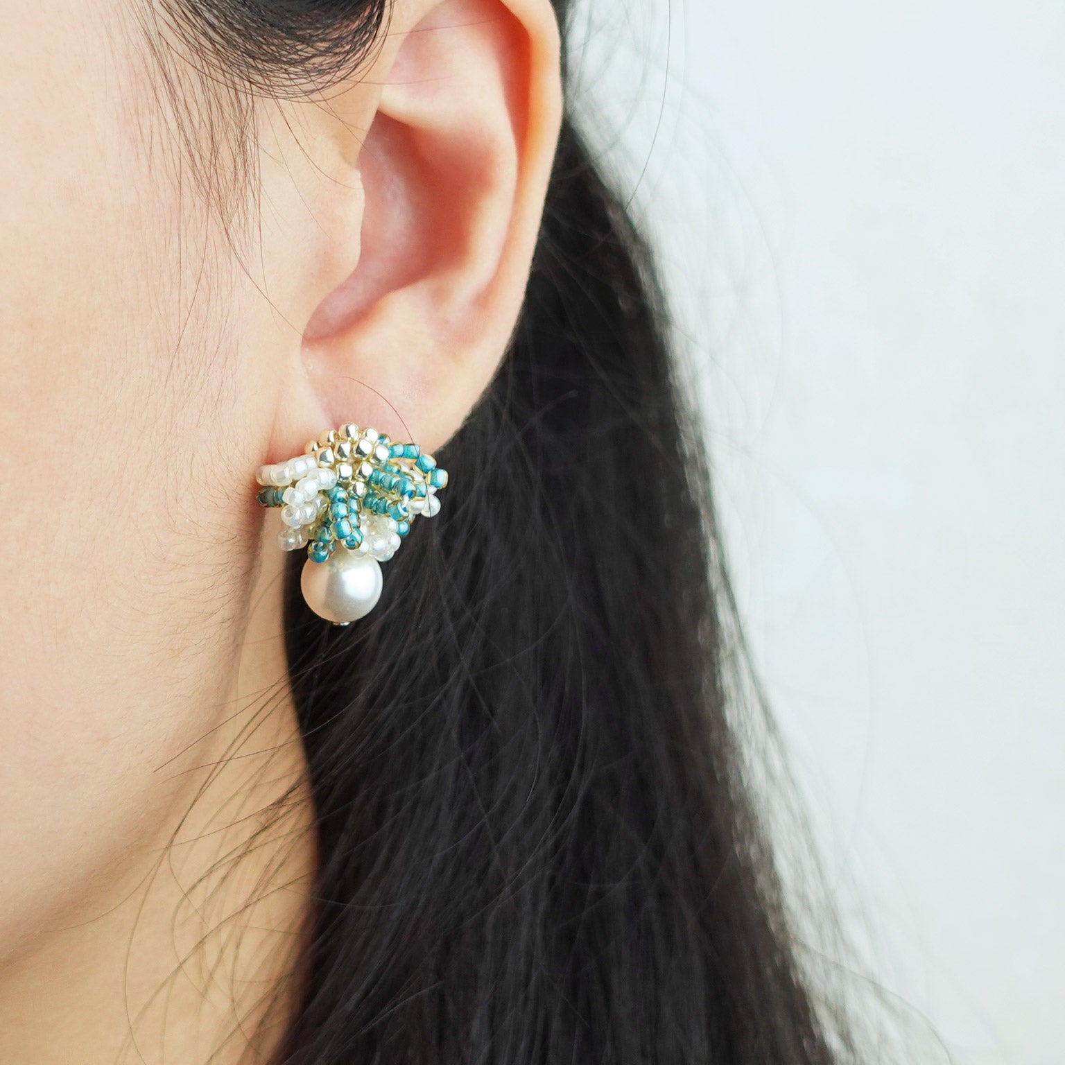 Camellia Mariota Bicolor Earrings in Ocean Green Model