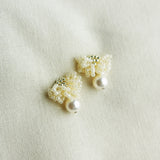Camellia Mariota Earrings in Ivory Left
