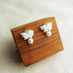 Camellia Mariota Earrings in White Display Top