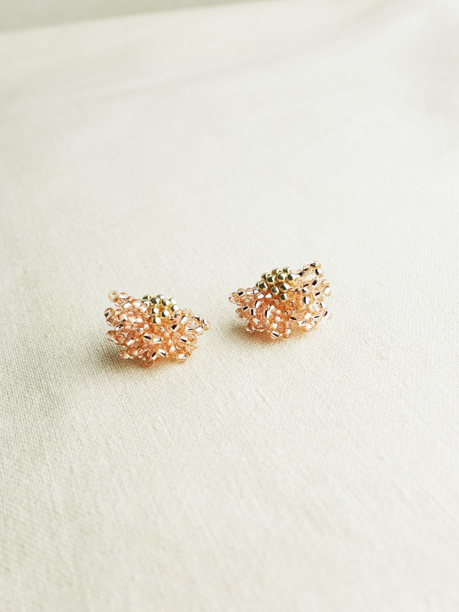 Camellia Stud Earrings in Champagne Pink Front