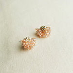 Camellia Stud Earrings in Champagne Pink Left