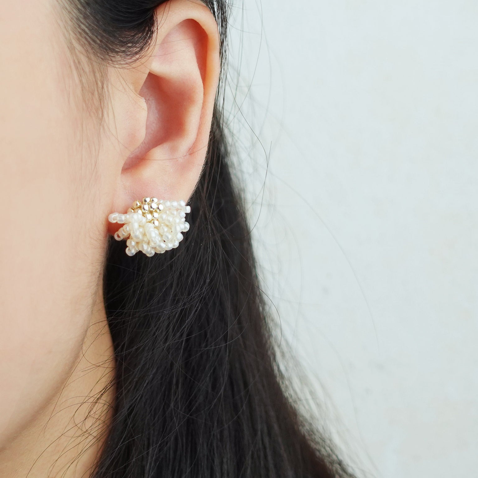 Camellia Stud Earrings in Ivory Model