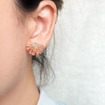 Camellia Stud Earrings in Strawberry Red Model
