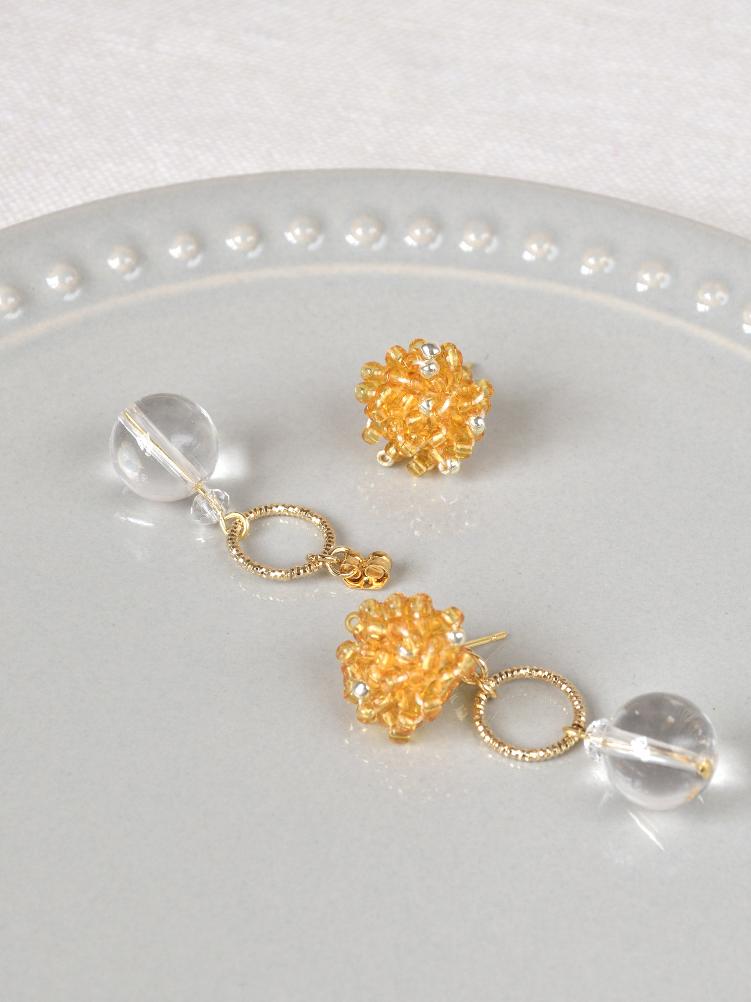 Cleon Quartz Dangle Earrings in Topaz Top