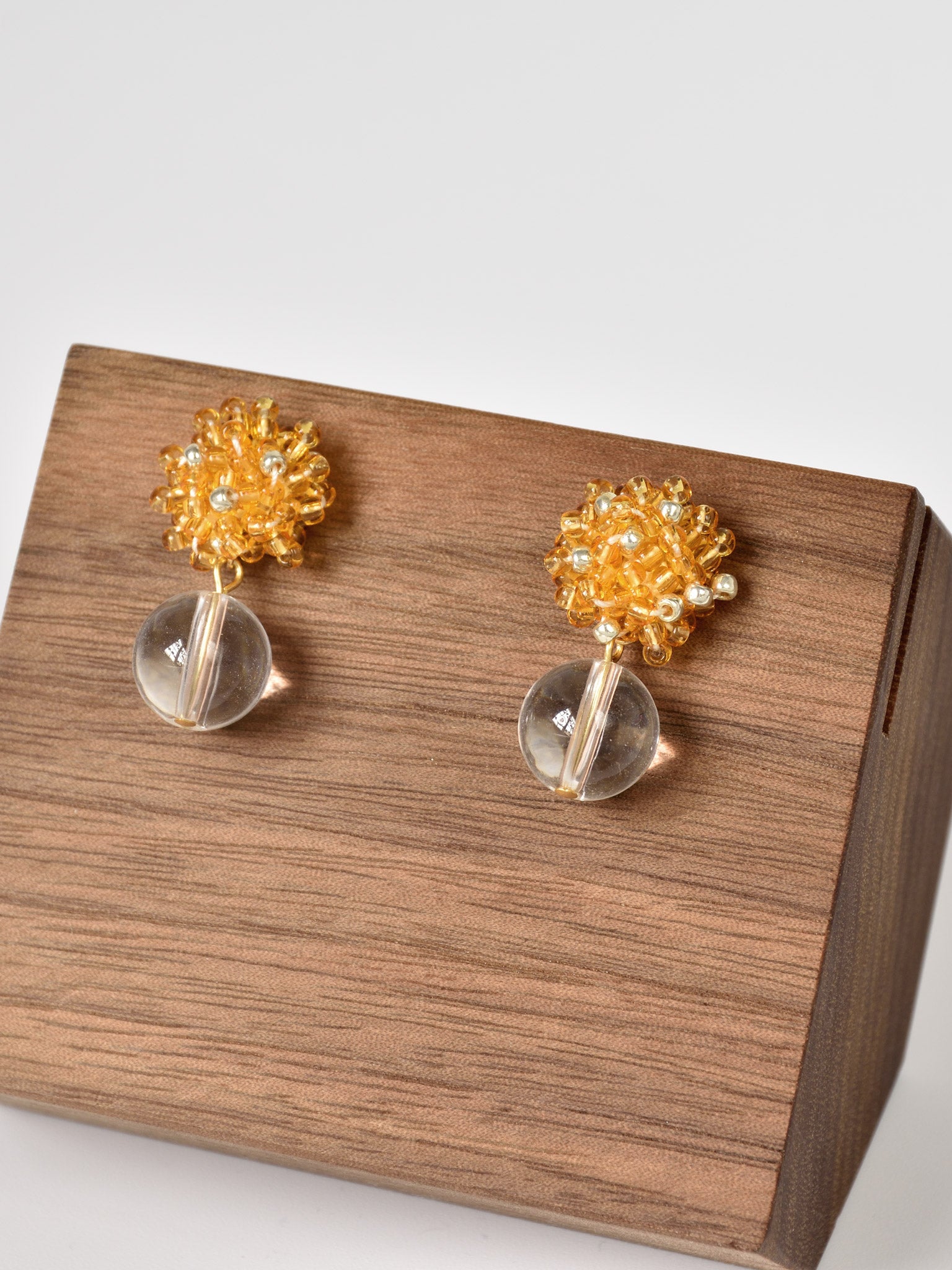 Coralia Quartz Earrings in Topaz Front
