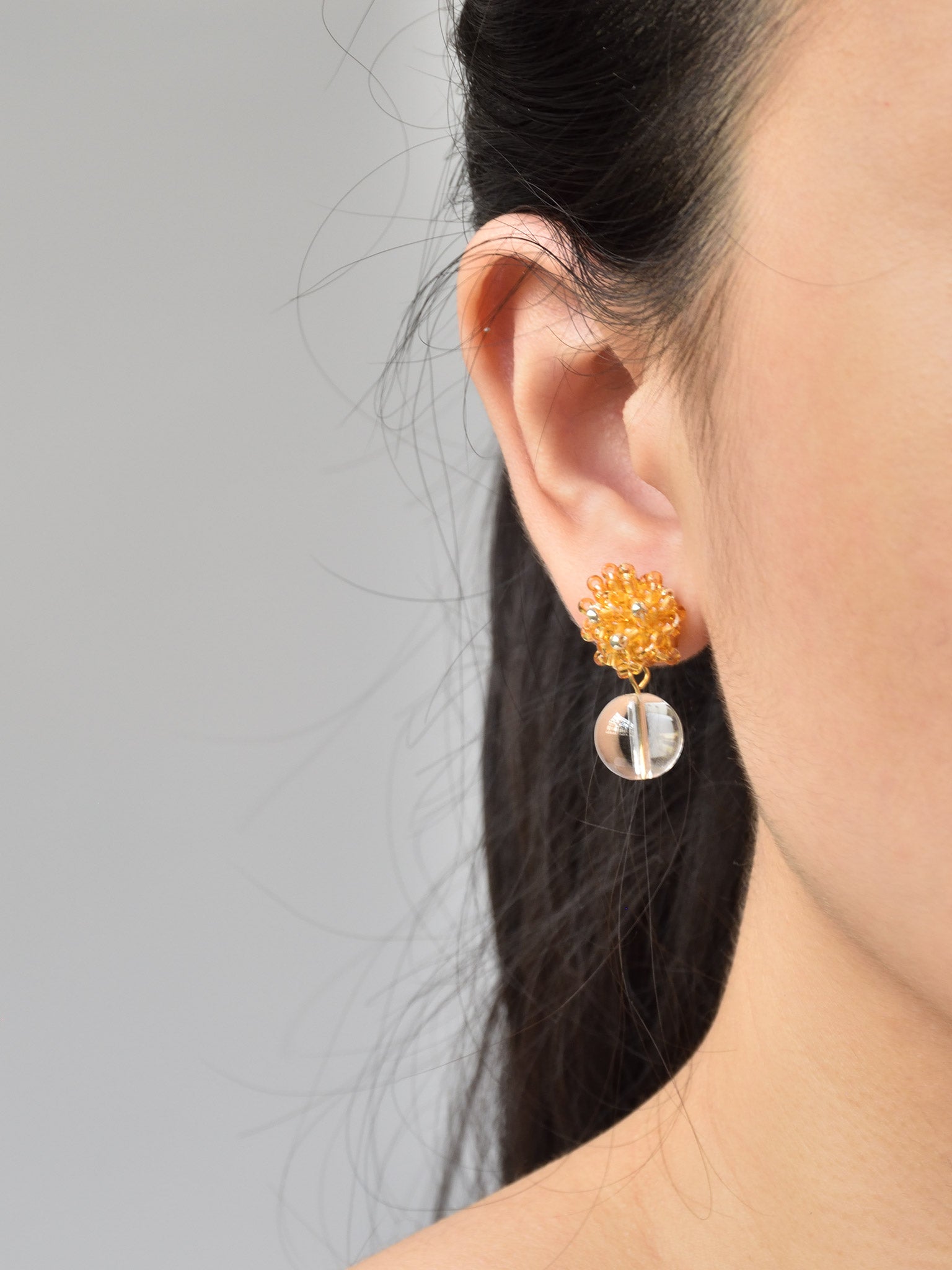 Coralia Quartz Earrings in Topaz Model