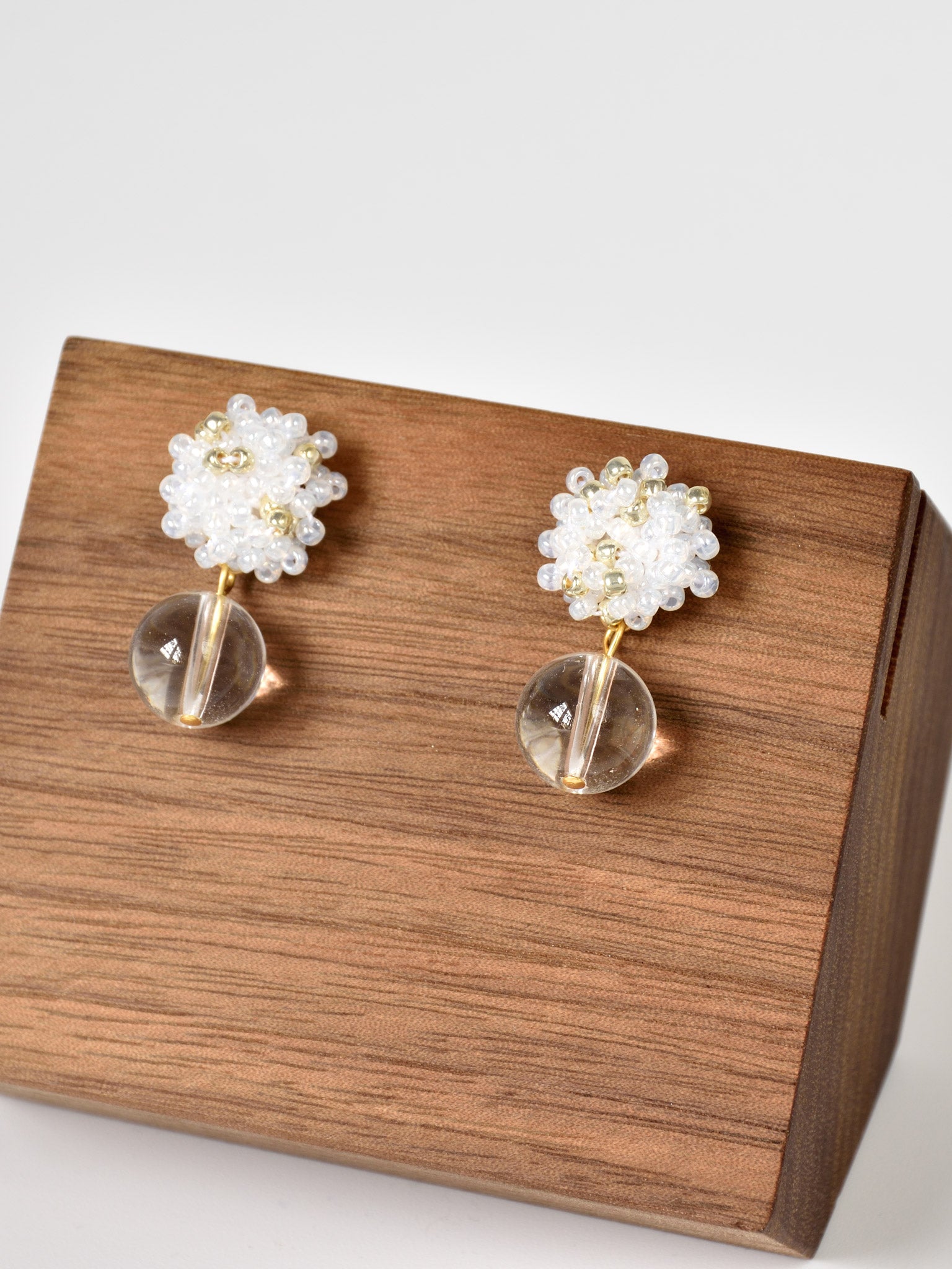 Coralia Clear Quartz Crystal Earrings in White Front