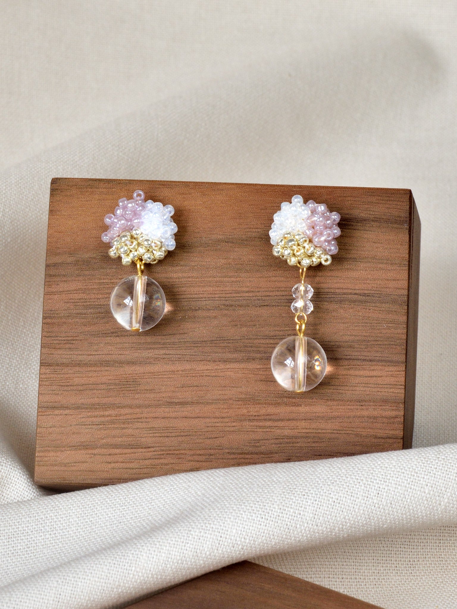 Cyrena Trio Quartz Earrings in Purple Display