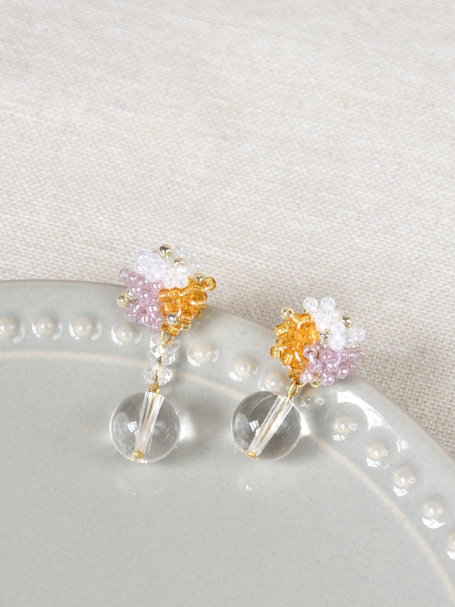 Cyrena Trio Earrings in Purple and Topaz Top 1