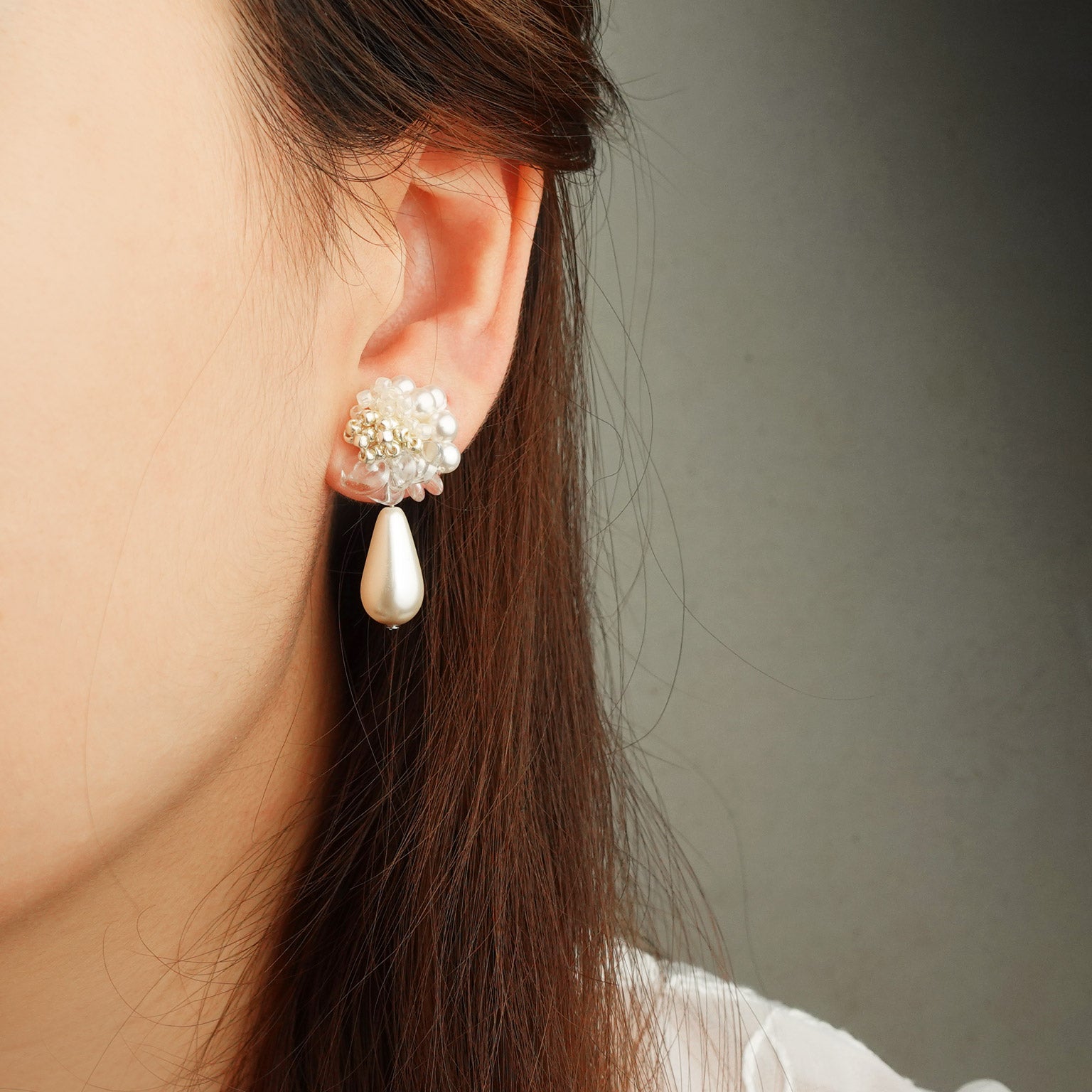 Diana Teardrop Mariota Earrings in Ivory Model