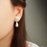 Diana Teardrop Mariota Earrings in Ivory Model