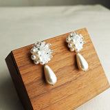 Diana Teardrop Mariota Earrings in White Display Left