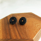 Donut Stud Earrings in Black Display Right