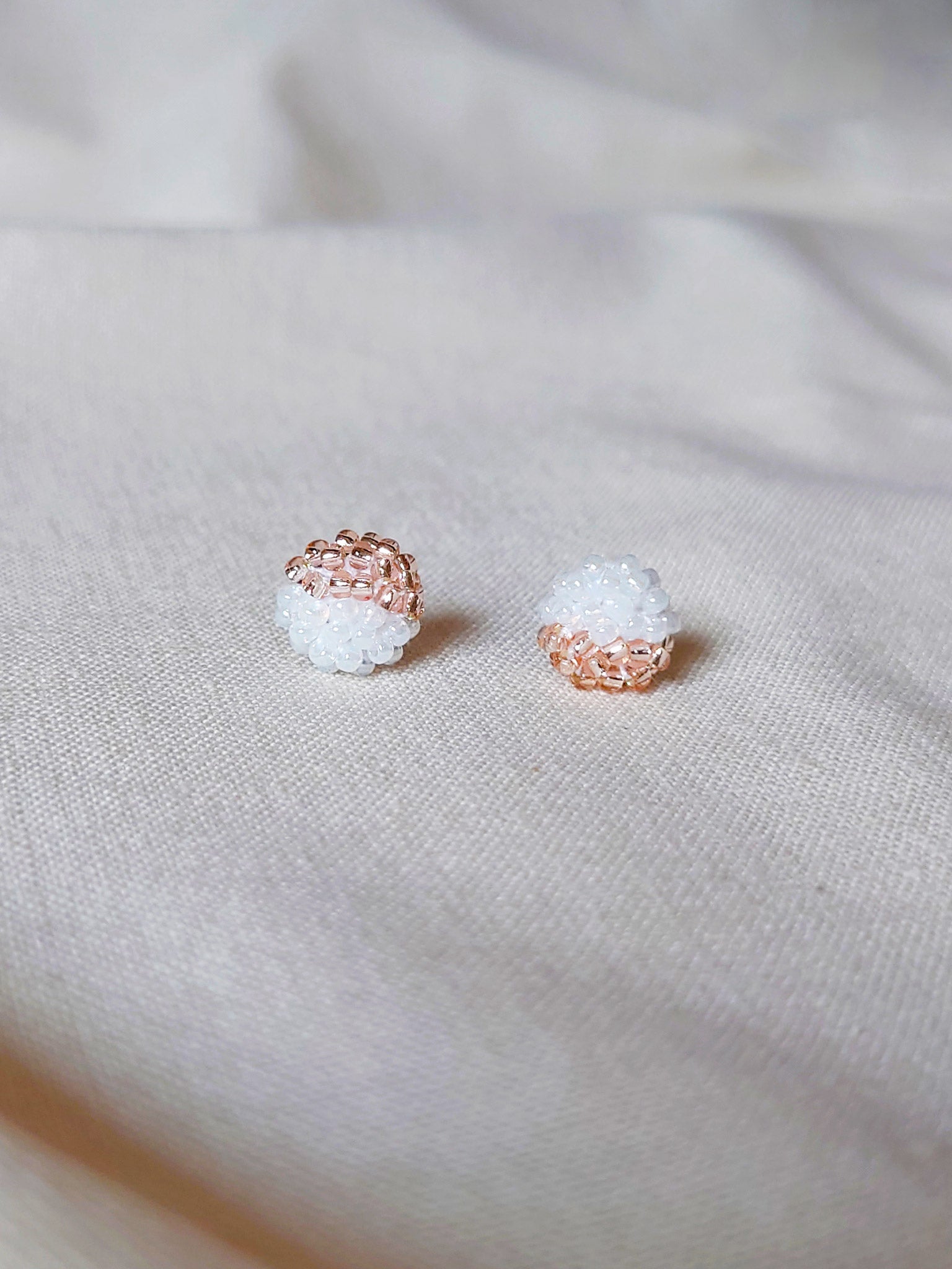 Duo Stud Earrings in Champagne Pink Front 2